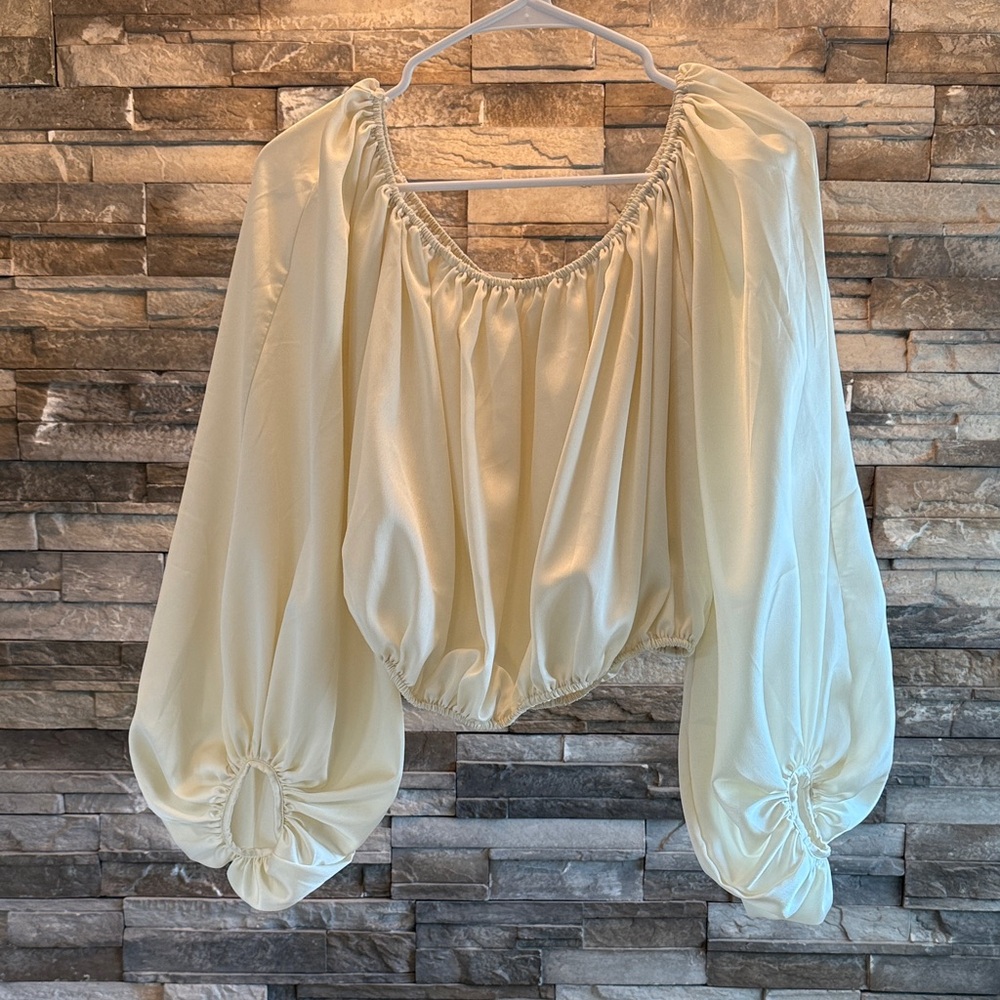 Buckle Chic Cream Women's Blouse with Flowing Sleeves